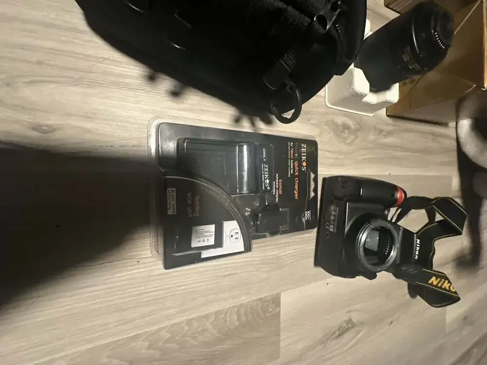 Nikon D3000 DSLR Camera Bundle with 55-200mm Lens and Bag
